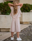 Trening din catifea nude cu pantalon evazat pentru fete