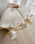 Rochie crem eleganta pentru fete, cu capa din tafta si accesorii pretioase - Sherry